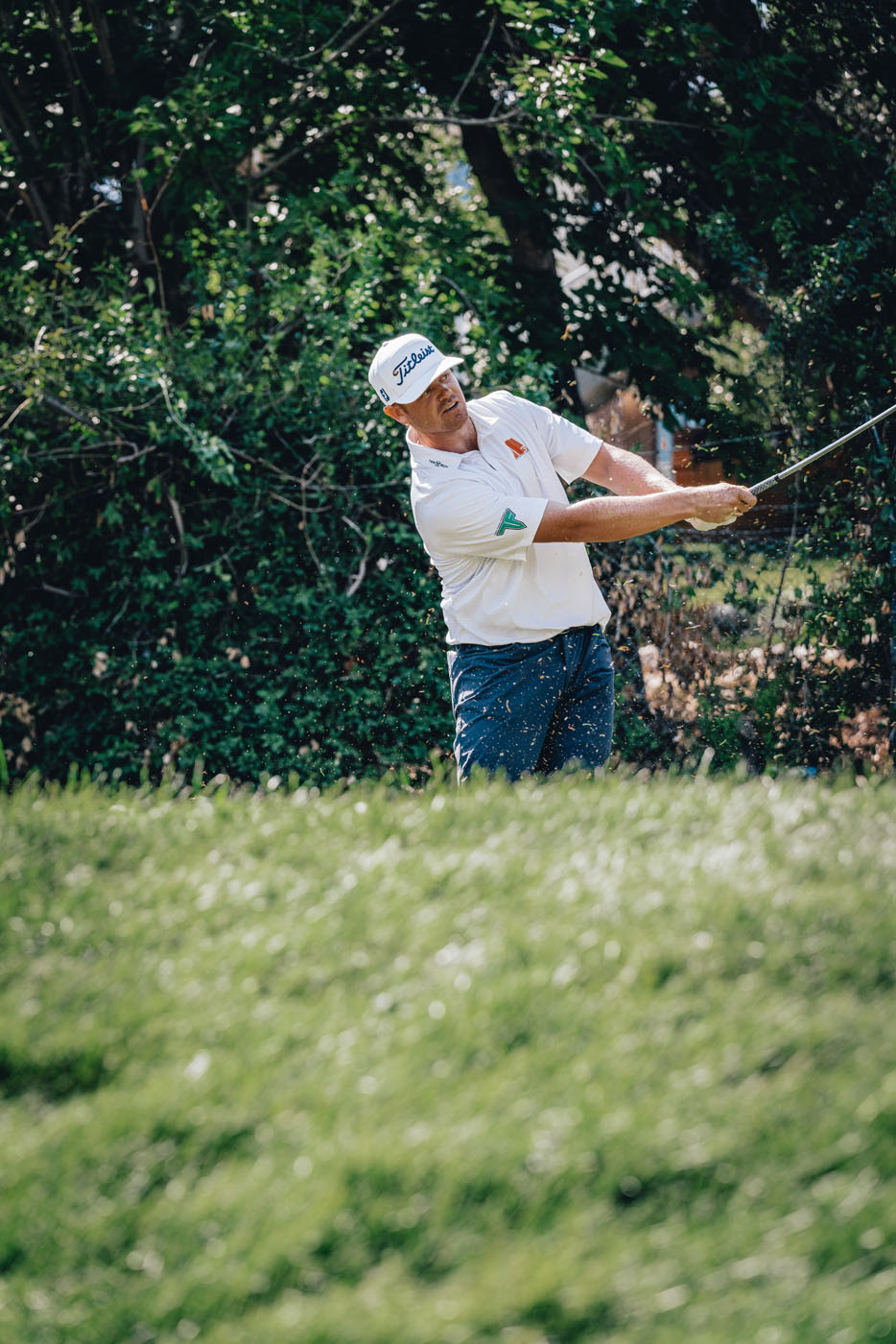 An image of athlete Patrick Fishburn hitting on the green - Tee Box.