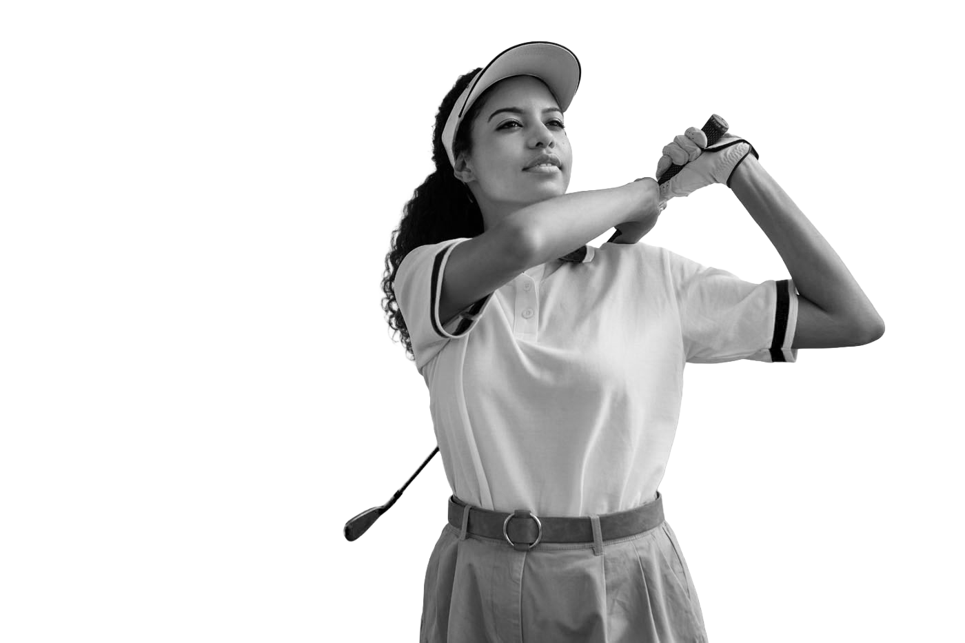 A golfer working on their swing after using a golf improvement plan from Tee Box.