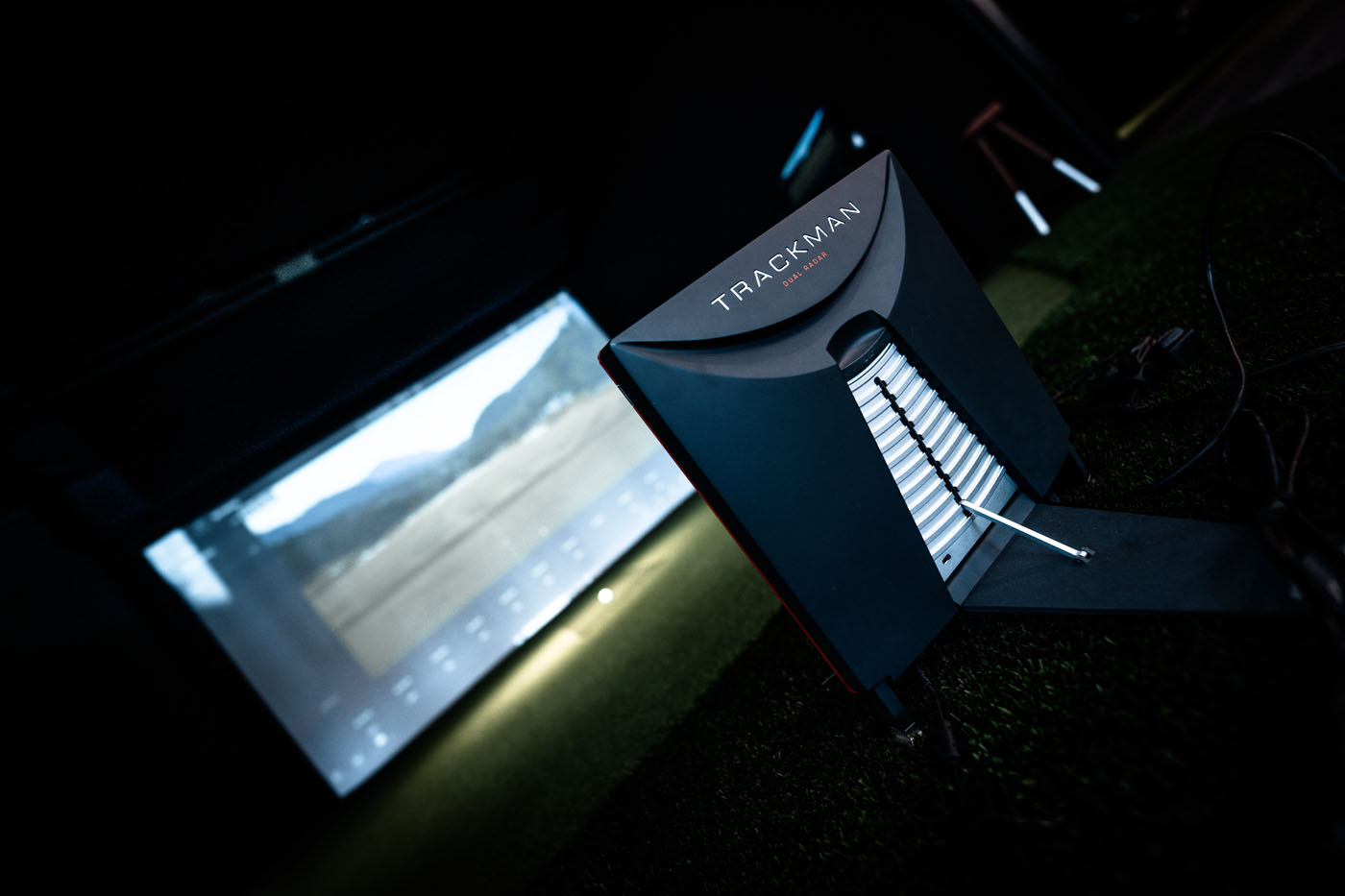Tee Box indoor golf hitting bay.