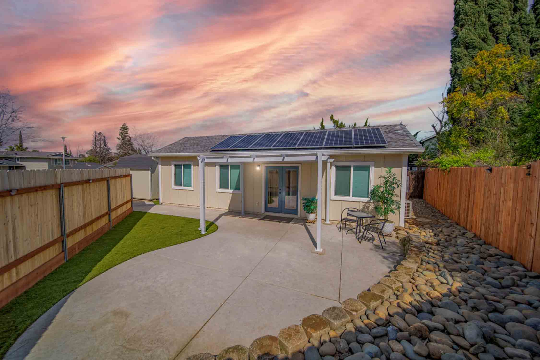 An ADU home with solar panels on the roof provided by top our top ADU builder.