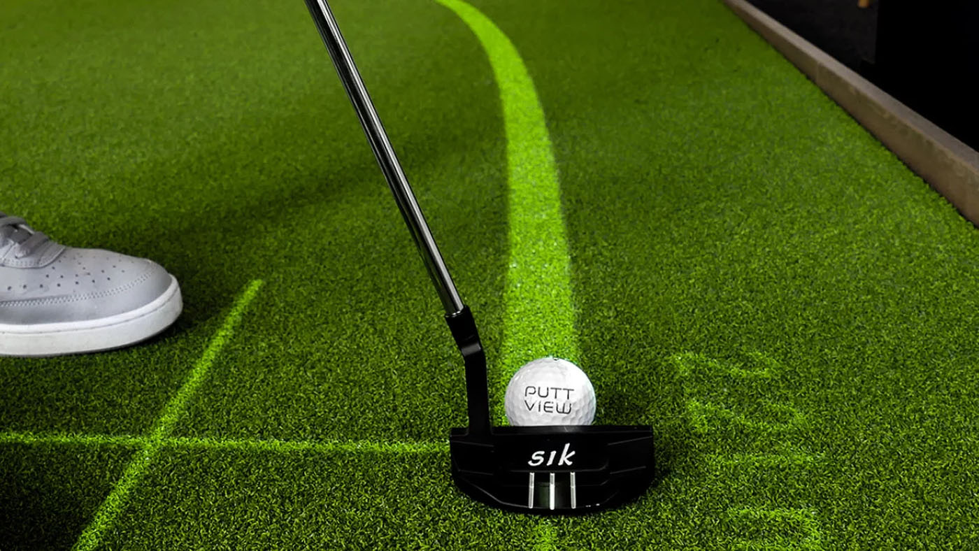 An image a putter and puttview golf ball used at Tee Box.